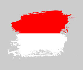 Artistic Indonesia national flag design on painted brush concept