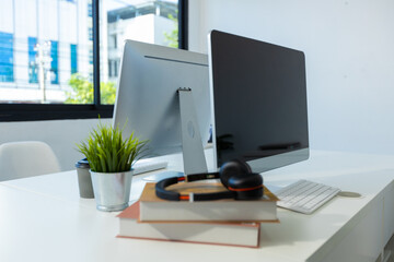 Young professionals having a discussion at a meeting in a modern office on a small conference in the meeting
