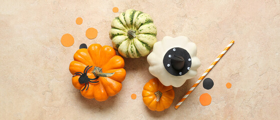 Composition with Halloween pumpkins and decorations on grunge background