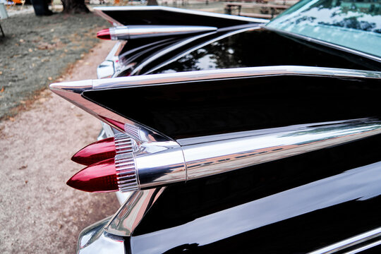 Tail fin of black painted American antique road cruiser