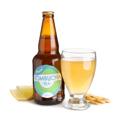 Glass of tasty kombucha tea with lemon and ginger on white background