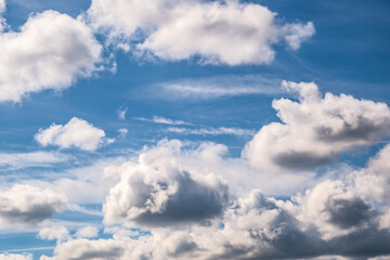 Obraz premium blue sky background with white striped clouds in heaven and infinity may use for sky replacement.