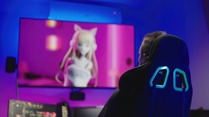 Anime tv show on big television in cyberspace room with man on gaming chair