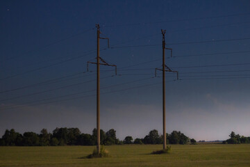 Fototapeta na wymiar power lines in the field