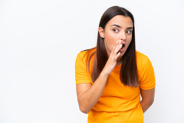 Young caucasian woman isolated on white background whispering something with surprise gesture while looking to the side