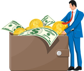 Businessman putting big dollar coin in wallet.