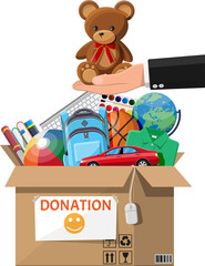 Donation box full of toys, books, clothes, devices