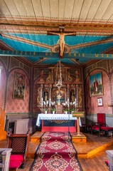 Naklejka premium Wooden Church of the Holy Trinity. Kucharki, Greater Poland Voivodeship, Poland