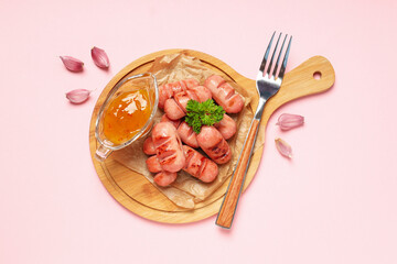 Concept of tasty food, grilled mini sausage, top view