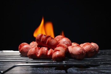 Concept of tasty food, grilled mini sausage