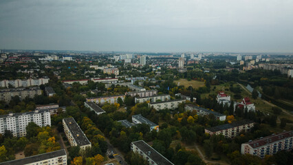 Fototapeta na wymiar Multi-storey buildings with infrastructure. Densely populated urban area. Overcast weather. Aerial photography.