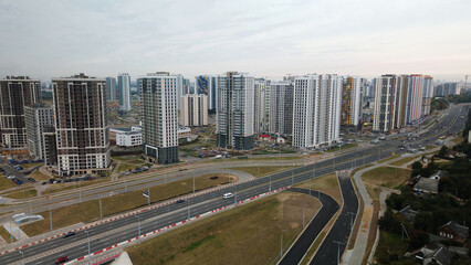 Busy city highway. Major road junction. Urban landscape. Aerial photography.