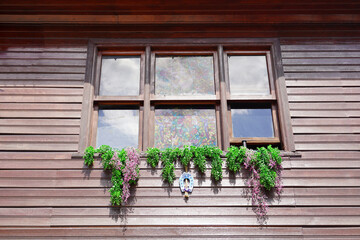 Fototapeta na wymiar window with flowers, Window with flowers in Turkish house, istanbul balat