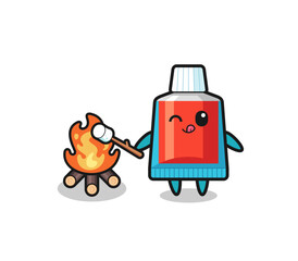 toothpaste character is burning marshmallow