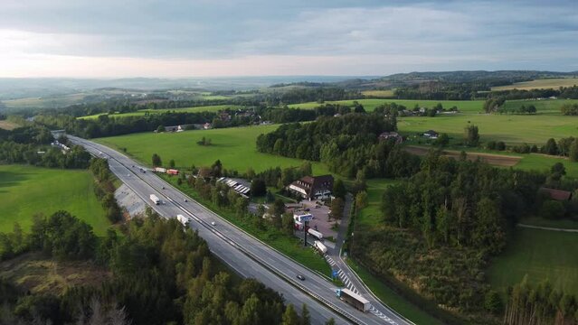 Aerial drone view of popular highway or expressway D1 in Czech Republic, sunset saturated colors, zoom in