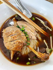 Top view noodle soup stewed duck on wood table