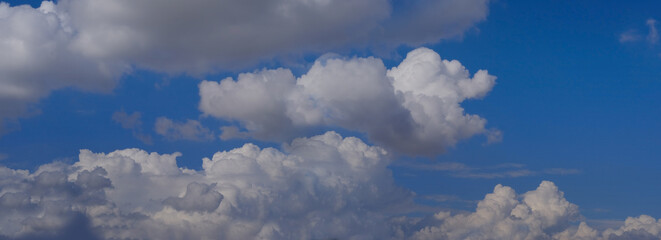 background light sky gradient, close-up of beautiful white fluffy clouds in blue sky, concept of...