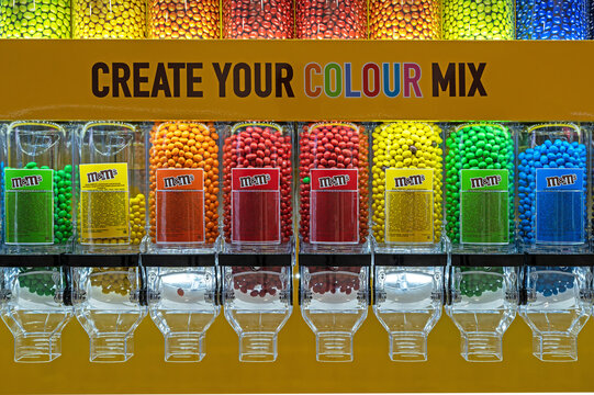 M&M'S different colors candies at store. M&M'S stand in the supermarket with the inscription "Create your colour mix". Minsk, Belarus, 2022