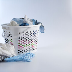 Basket with dirty clothes for washing