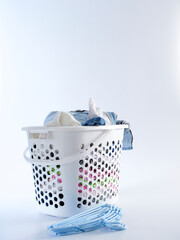 Basket with dirty clothes for washing