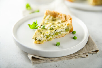 Homemade green pea quiche with cheese