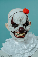 creepy evil clown with a menacing smile