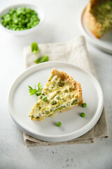 Homemade green pea quiche with cheese