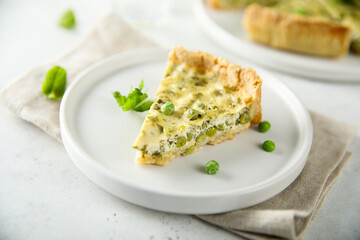 Homemade green pea quiche with cheese