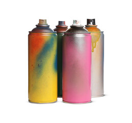 Used cans of spray paints on white background