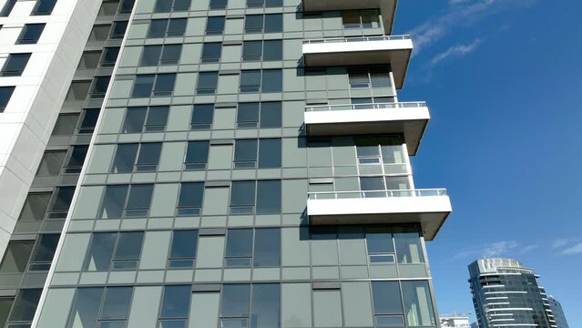 Rising aerial shot of a towering condo complex in Seattle's South Lake Union neighborhood.