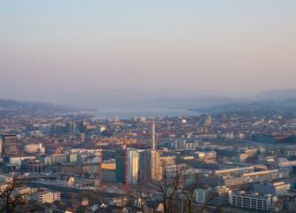 Zurich, Switzerland - March 26th 2022: Panoramic view over the city from the famous viewpoint Waid.