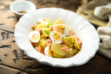 Potato salad with eggs and salmon