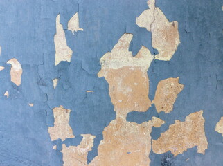 Closeup of peeling painted wall