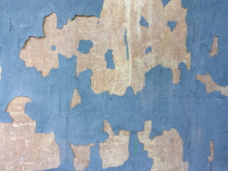 Closeup of peeling painted wall