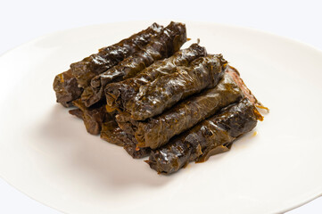 Pile of dolma - stuffed grape leaves with minced meat