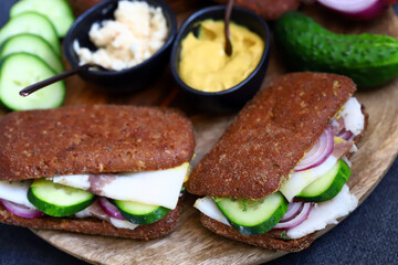 Appetizing sandwiches with lard, onions and cucumbers. Ukrainian snack.