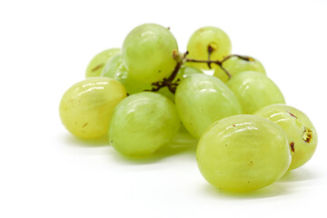 bunch of green grapes on white background