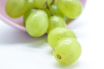 bunch of green grapes on white backgroundv