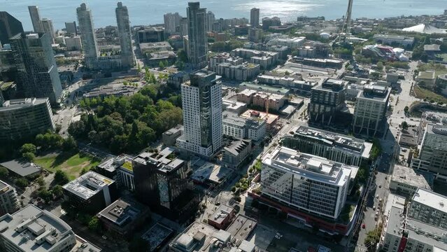 Aerial shot starting with a view of the Space Needle and tilting down to focus of Seattle's South Lake Union neighborhood.