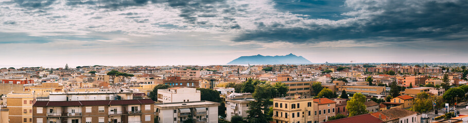 Fototapeta premium Terracina, Italy. Skyline View Of Terracina With Circeo Promontory And Tyrrhenian Sea In Background. Panorama. Panoramic View