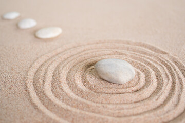 Japanese Zen Garden with Pebble with Line on Sand,mini Stone on Beach backgrond Top View and nobody,Ciircle Rock Balance Japan on nature,Simplicity Purity life,Relax Aromatherapy Spa and Yoga,Buddhism