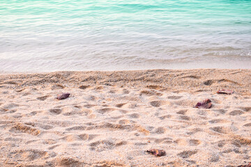 Sand Beach with Blue Sea  Beautiful at Coast,Beautiful Blue Ocean Shore Outdoor Nature Landscape Water  Background,Tourist Summer Travel Holidays Tropical Season concept.