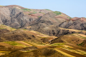 Fields and mountains in the north of Afghanistan near Faizabad city