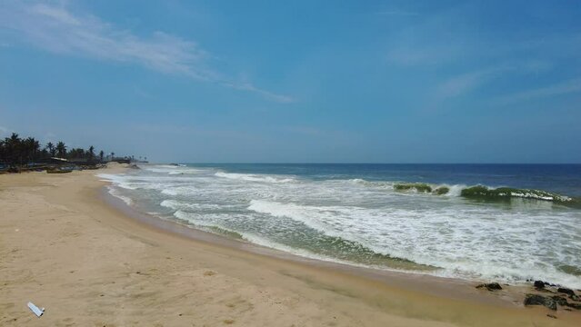 Tamil Nadu coastline, Kanyakumari district, bright blue sky, seascape view