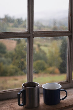 two cups on the window