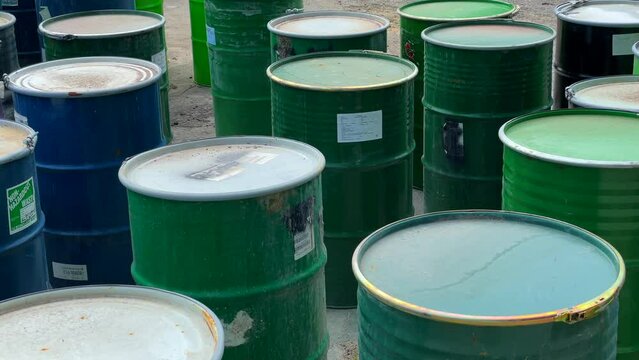 Oil barrel and waste container at shipping industrial depot in Canada