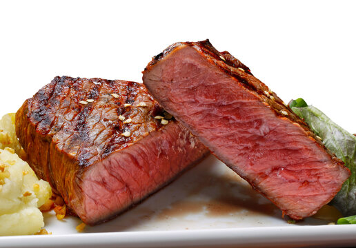 sliced grilled steak served , Picanha