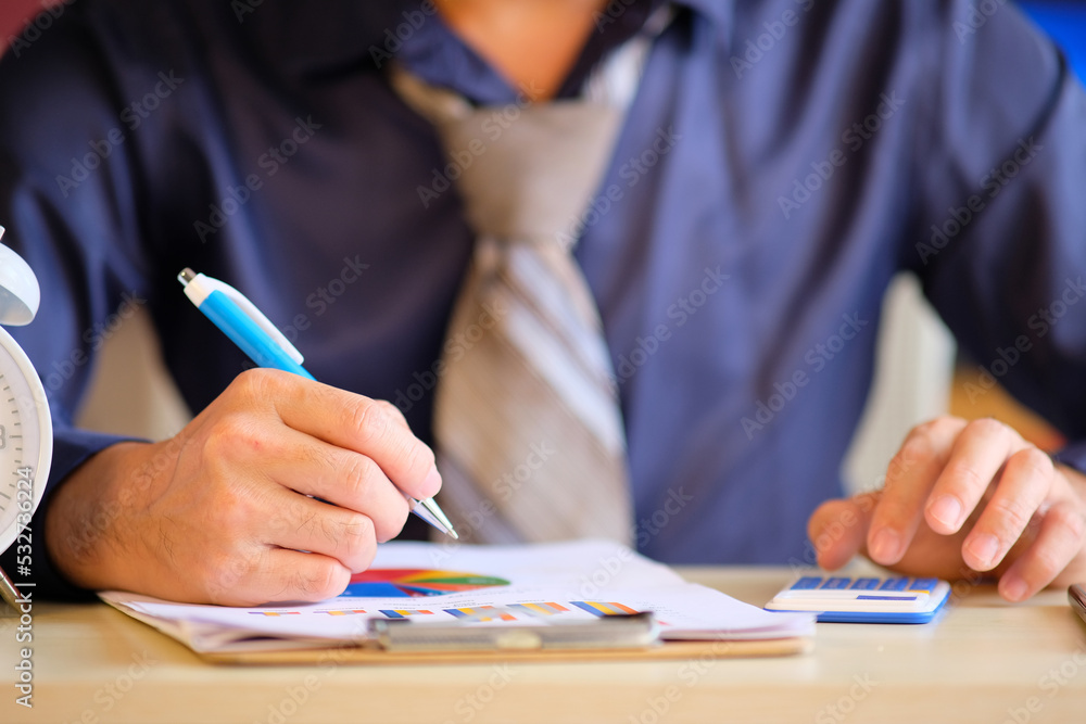 Aufkleber man accountant working in office with calculator and computer. concept of finance and accounting