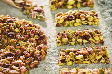 Arabic traditional sugar coated pistachio sweets. Egyptian oriental dessert usually eaten during 