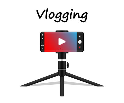 Recording vlog using mobile with tripod. Vlogging concept